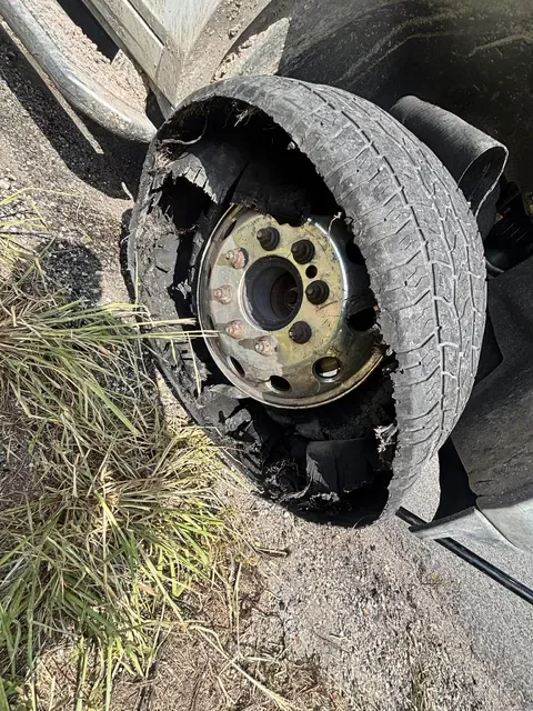 Blown tire on the rim &mdash; Sam&rsquo;s Tire Service